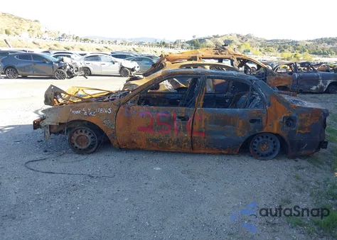 1999 Toyota Corolla Ce из США, поврежденный, VIN 1NXBR12E4XZ178165